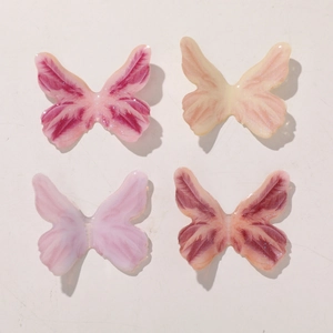 DIY butterfly resin charms with glitter gradient finish and 3D wing texture for jewelry