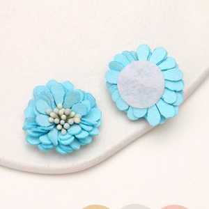 Detailed view showing front and back of 3cm blue microfiber daisy craft flowers