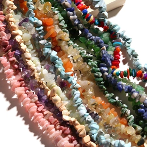 Close-up of polished irregular natural gemstone beads for DIY jewelry making and crafts