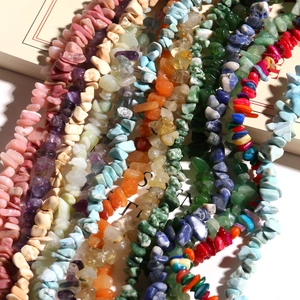 Detailed view of colorful natural irregular stone beads for DIY jewelry making