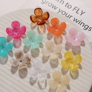 Detailed view of colorful acrylic flower petals for DIY jewelry and hair accessories