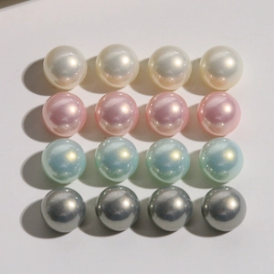 Detail of 12mm gradient pearl beads in 4x4 grid showing cream pink green and grey finishes