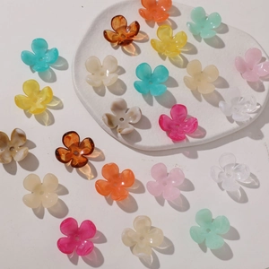 Macro view of colorful acrylic flower beads with marble texture for DIY hair stick making