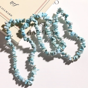Detail shot of irregular turquoise natural stone chip beads for jewelry making