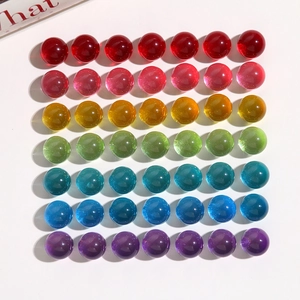 Macro shot of 14mm colorful jelly resin beads in a rainbow 7x7 grid layout
