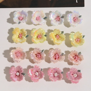 Detailansicht von 16 bunten schillernden Harzblumen für DIY Haarnadeln und Bastelzubehör