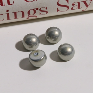 Detail of 12mm iridescent gradient faux pearls with high metallic luster for DIY jewelry