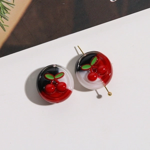 Detailed macro shot of sweet cherry resin beads for DIY earring and jewelry making