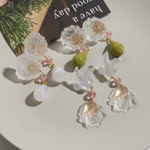Handmade frosted resin floral drop earrings with pink crystals and artistic charms