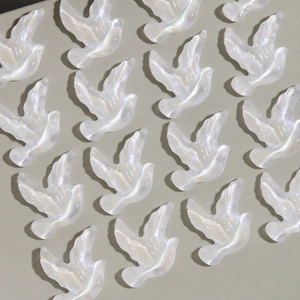 Charm's hirondelle en résine irisée pour bricolage avec finition nacrée scintillante