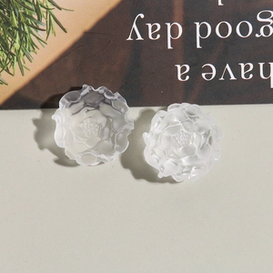 Detailed view of matte resin tulip flower charms for DIY jewelry and phone case making
