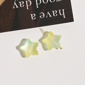 Frosted matte star earrings with candy gradient finish and golden metal pins