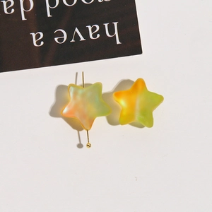 Detail of candy color gradient star beads with matte finish for DIY jewelry making