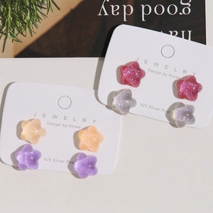 Glittery resin star stud earrings in assorted candy colors with 925 silver needles