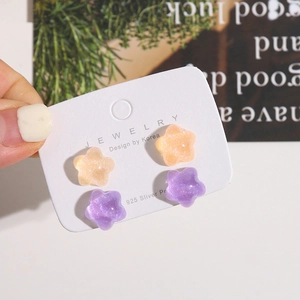 Glitter resin star stud earrings in orange and purple with S925 silver needles