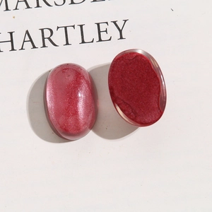 Macro di perni ovali in resina rossa glitterata per creazione di gioielli fai da te