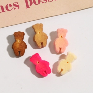 Macro shot of 5 assorted flocking bear resin beads for DIY jewelry making accessories