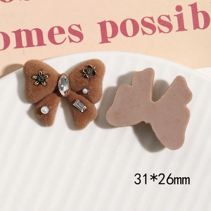Brown flocking bow jewelry part with rhinestones and vintage metal flower elements