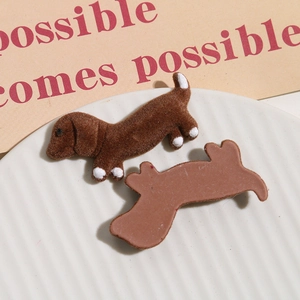 Detail of brown flocked dachshund DIY charms showing soft texture and flat back base