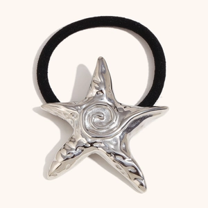 Black elastic hair tie featuring a polished silver starfish charm with natural textures