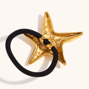 Gold starfish hair tie with hammered metal texture and high-elastic black rubber band