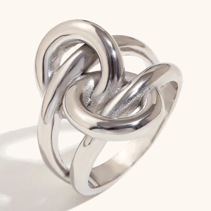Polished silver double-layered knotted winding ring in minimalist stainless steel design