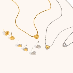 Golden heart necklace and stud earrings set with twisted rope border in stainless steel