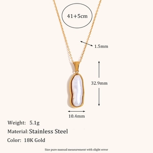 Detailed view of an 18K gold stainless steel necklace with a baroque pearl pendant
