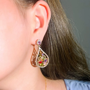 Champagne gold teardrop earrings featuring multi-color cubic zirconia and openwork design