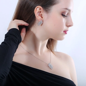 Elegant silver jewelry set with starburst zircon pendant necklace and stud earrings