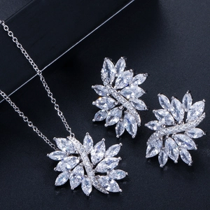 Detail of silver leaf necklace and earrings set with marquise-cut sparkling cubic zirconia