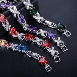Elegant silver-tone bracelets with multi-color oval crystals and sparkling zircon accents