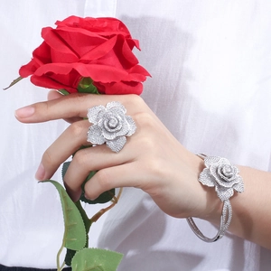 Elegant rose jewelry set with silver flower ring and bangle encrusted with cubic zirconia