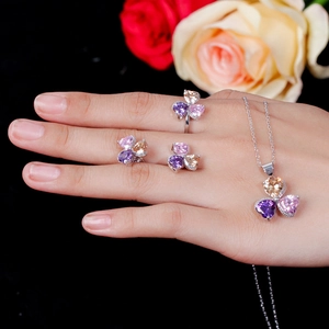 Three-piece jewelry set with clover-shaped zircon ring, earrings and necklace