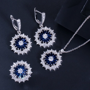 Elegantes 925 Silber Schmuckset mit blauen AAA Zirkon Schneeflocken Halskette und Ohrringen