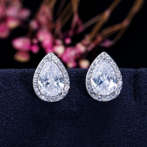 Sparkling pear cut halo drop earrings with AAA cubic zirconia in silver-tone setting