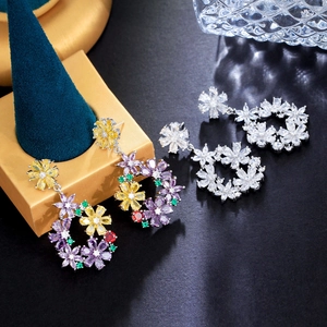 Detailed close-up of S925 floral drop earrings featuring colorful zircon and crystal
