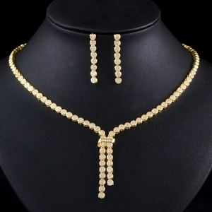 Sparkling zircon necklace and earring bridal jewelry set on a black neck model