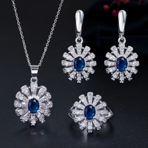 Elegante zilveren bruidssieradenset met marineblauwe stenen en zirkonia bloemen
