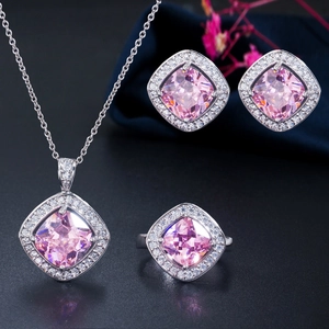 Elegant silver jewelry set with square pink zircon necklace, ring, and stud earrings