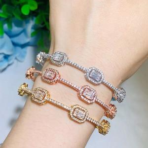 Sparkling geometric bangle set with zircon inlay in gold, silver, and rose gold finish