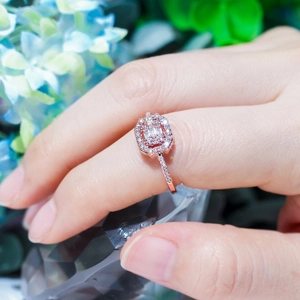 Classic rose gold ring for women with emerald-cut zircon and pave crystals