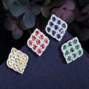 Macro shot of marquise-cut gemstone jewelry sets with zircon accents in four colors