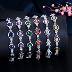 Elegant silver-toned bracelet collection featuring oval AAA zirconias in six vibrant colors
