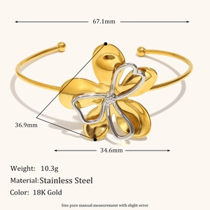 Minimalist flower cuff bangle in 18K gold plated stainless steel with silver petals