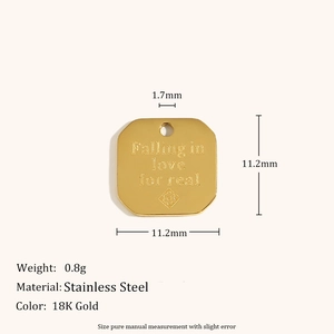 Detailed view of 18K gold plated stainless steel square pendant with engraved text