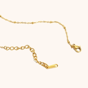 18K gold plated stainless steel necklace featuring small gold beads and lobster clasp
