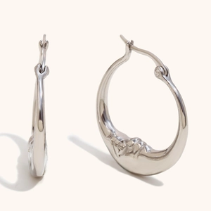 Chic silver moon hoop earrings with embossed texture made of durable stainless steel