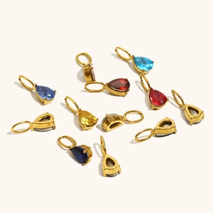 Detailed view of 18K gold-plated teardrop gemstone pendants in multiple colors