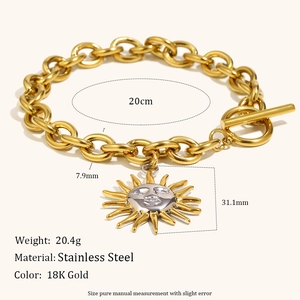 Detailed view of 18K gold plated stainless steel sun pendant bracelet with OT clasp